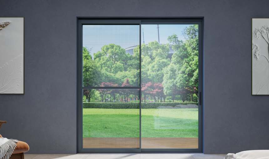 Grey aluminium sliding door overlooking a green landscape
